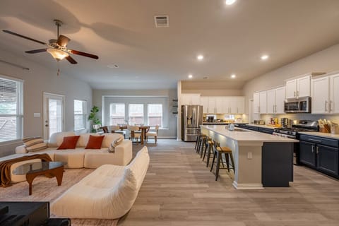 Open-concept kitchen and lounge — perfect for cooking together and making memories.