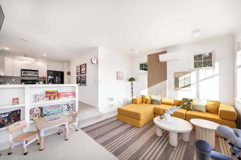 Spacious open layout connecting kitchen and living room seamlessly.