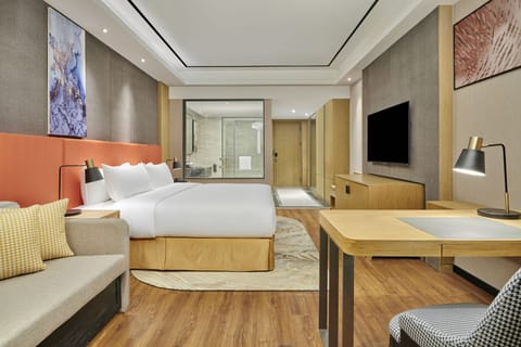 Deluxe Room, 1 King Bed | Premium bedding, down comforters, memory foam beds, minibar