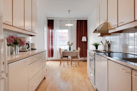 Cook your favorite meals and gather around the dining table for four to enjoy them together.