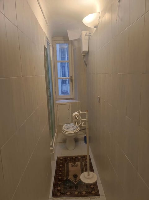 Separate tub and shower, towels, toilet paper