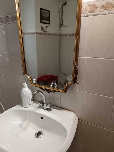 Separate tub and shower, towels, toilet paper