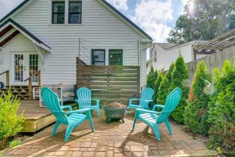Private patio with seating and firepit