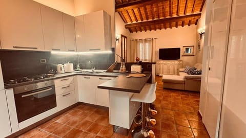 Furniture, Interior Design, Flooring, Countertop, Wood, Kitchen, Floor, Ceiling, Cabinetry, Kitchen Appliance