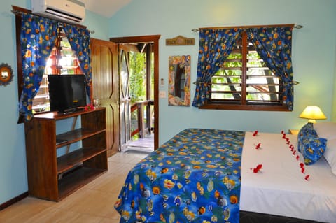 Romantic Bungalow, 1 King Bed | Pillowtop beds, minibar, in-room safe, iron/ironing board