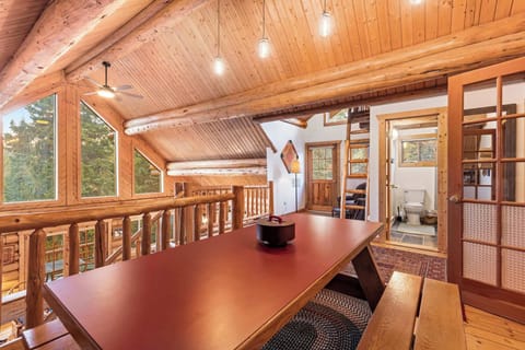 Loft Hangout (upper floor): Full-size futon, game table, kid-friendly layout