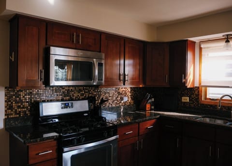 [Full Kitchen] ~ Dishware, flatware, and dining utensils, Essential cooking utensils, Stocked with basic supplies: paper towels, trashbags, etc.