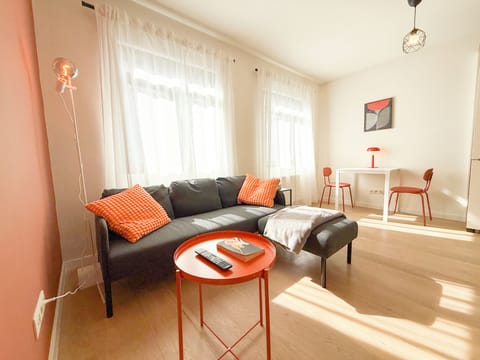 A bright and comfortable living area designed for relax after a day in Antwerp