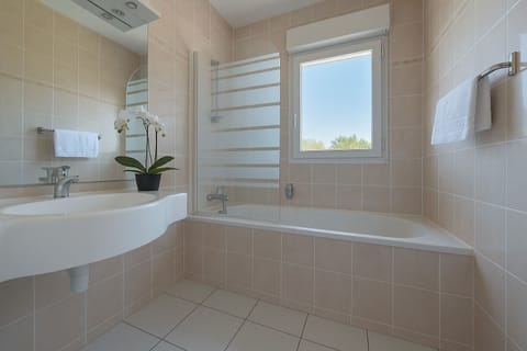 Hair dryer, towels, soap, shampoo