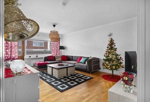 Step into our bright and spacious living room, designed for ultimate relaxation after a day of exploring.