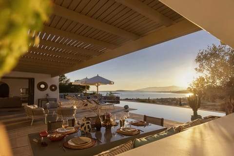 It's nearly time for dinner on Palmyra's shady, sea-view terrace.