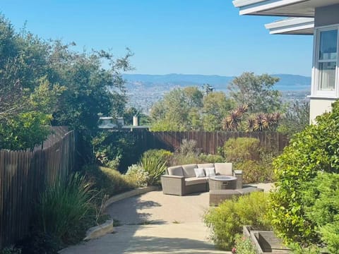 Spacious backyard with comfortable patio seating-perfect for enjoying sunsets.