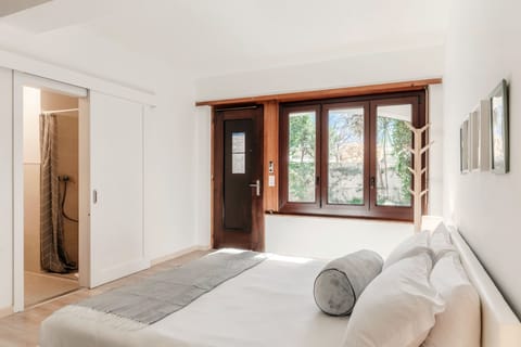 Comfort Room, Patio | Down comforters, iron/ironing board, free WiFi