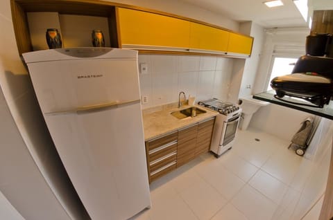 Apartment, 2 Bedrooms | Private kitchen | Fridge, microwave, stovetop, coffee/tea maker