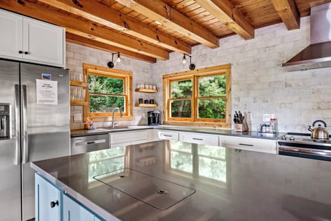 Chef's kitchen! Huge island with quartz counters and ample seating.