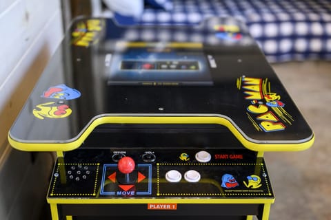 Relive arcade classics and spark a little friendly competition in the bunkhouse game room.