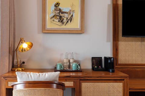 Adiwana Room | Free minibar items, in-room safe, desk, free cribs/infant beds