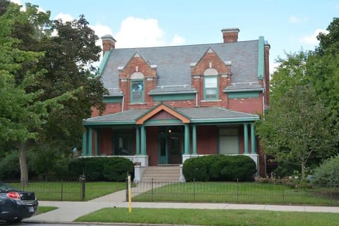 This former home of Peter Studebaker of the Studebaker family was built in 1895. This building is in the Queen Anne style architecture. There is a private parking lot which can be access by a brick driveway located to the left (west) of the building.