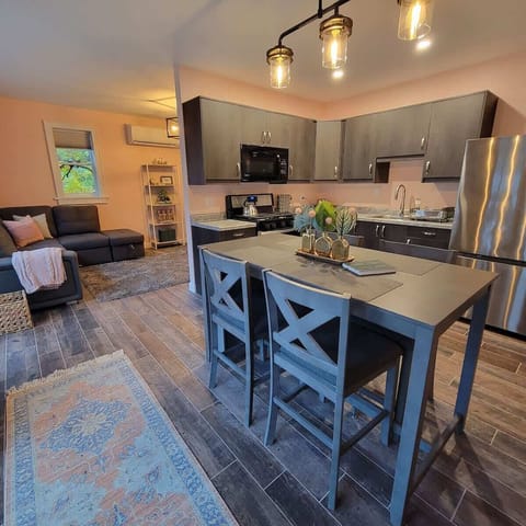 Welcome to this completely renovated, spacious, and stylish space. The room gets great light during the day but blackout curtains and blinds allow for mid day napping! The table is great for eating or working.