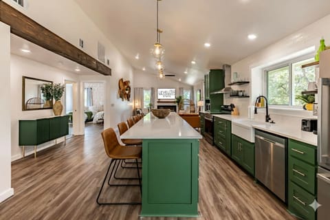 Modern elegance meets function in this bright, fully equipped kitchen