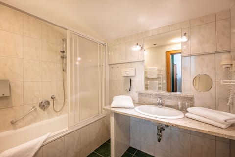 Suite, Balcony | Bathroom | Hair dryer, bathrobes, towels, soap