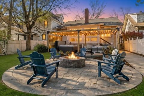 Thoughtfully designed outdoor space with a cozy fire pit, putting green, and easy walkways that's perfect for entertaining, relaxing, and enjoying the outdoors in comfort.