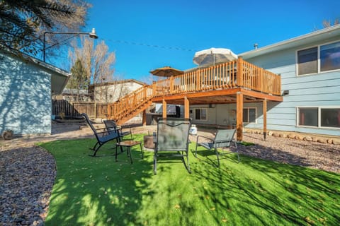Welcome to Trailbend Crossing! The backyard features a cozy fire pit area with plenty of seating, perfect for evening conversations or laid-back outdoor time.