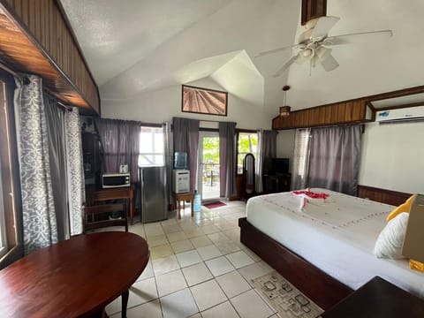 Honeymoon Cabin, Balcony, Ocean View | In-room safe, desk, free WiFi, bed sheets