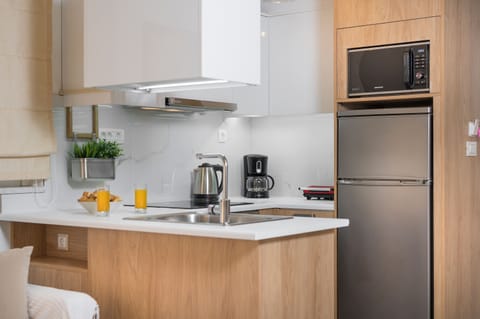 A fully equipped kitchen space where culinary creativity meets convenience.