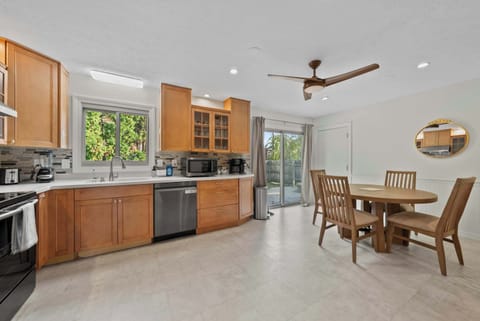 The inviting eat-in kitchen is well equipped for an unforgettable getaway