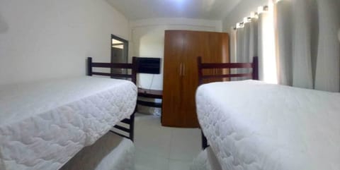 Economy Quadruple Room, City View | Blackout drapes, iron/ironing board, free WiFi