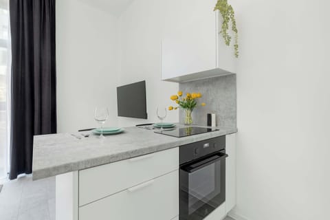 The kitchenette's practical layout maximizes space and functionality.