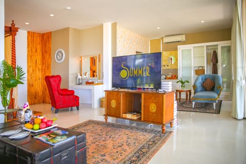 Luxury Beachfront Suite | Living area | 55-inch Smart TV with digital channels, Netflix, streaming services