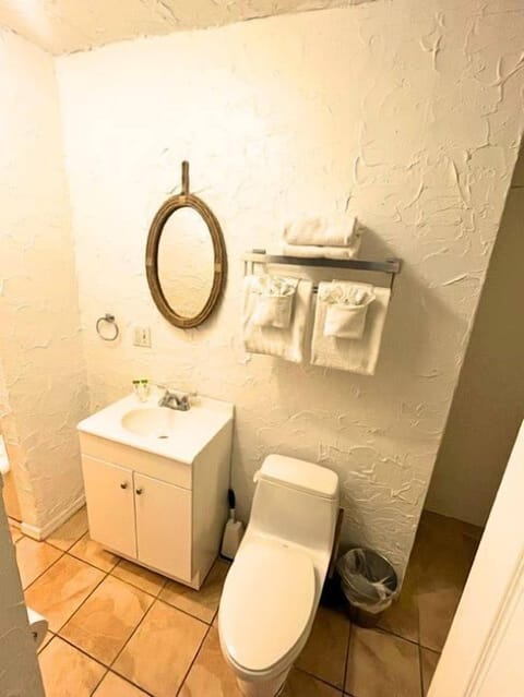 Second Floor Apartment Waterview | Bathroom | Eco-friendly toiletries, hair dryer, towels, soap