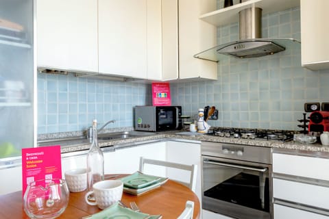 Apartment, 2 Bedrooms, Sea View | Private kitchen | Fridge, microwave, oven, stovetop