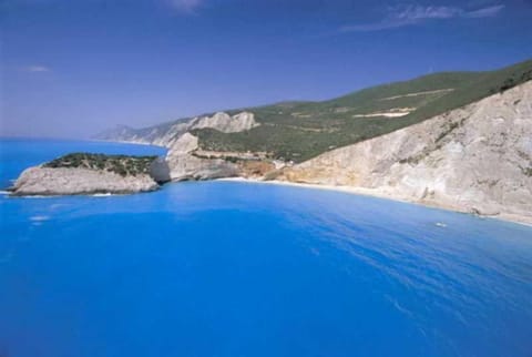 On the beach, sun loungers, beach umbrellas, beach towels