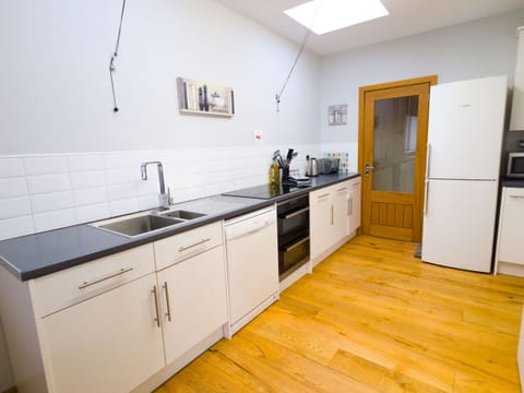 Functional family-friendly kitchen ideal for preparing meals together.