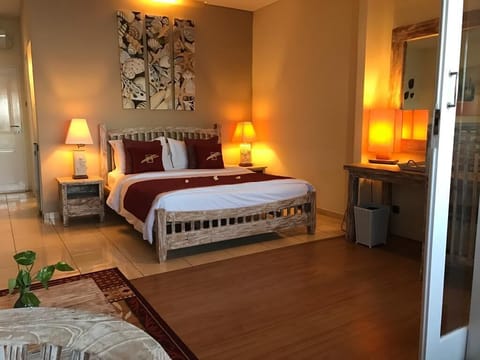 Deluxe Double Room, Ocean View | Minibar, in-room safe, desk, laptop workspace