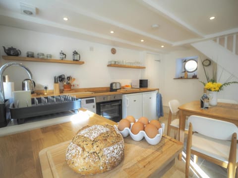 Loaf of bread, eggs in the kitchen at Gervic Cottage