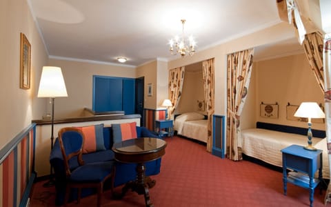 Duplex (Maisonette) | Minibar, in-room safe, individually decorated, individually furnished