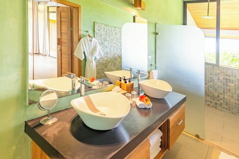 Suite (Jungle, One King Bed) | Bathroom | Shower, rainfall showerhead, eco-friendly toiletries, hair dryer