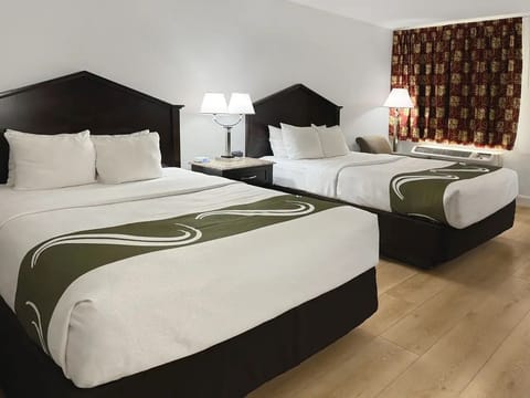 Desk, laptop workspace, blackout drapes, iron/ironing board