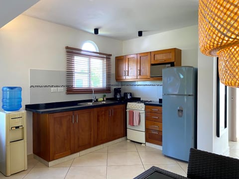 Standard Apartment, 2 Bedrooms, Garden View | Private kitchen | Full-size fridge, microwave, stovetop, coffee/tea maker