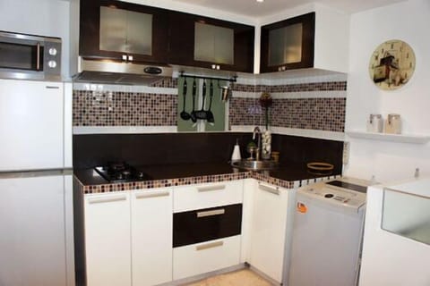 2 Bedroom Loft Studio Unit 6K | Private kitchen | Full-size fridge, microwave, stovetop, cookware/dishes/utensils