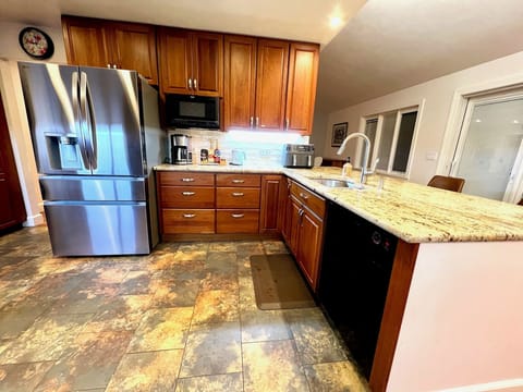Fully equipped kitchen with coffee station