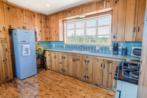 Full Kitchen with everything needed for a homecooked meal!