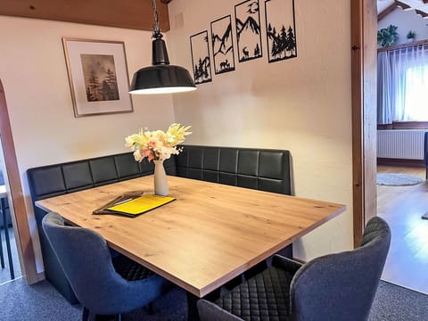 Furniture, Interior Design, Flooring, Wood, Table, Floor, Kitchen & Dining Room Table, Lighting, Light Fixture, Dining Room