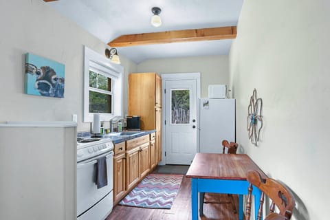 Looking through kitchen area to side door from the front door - Coyote Cabin