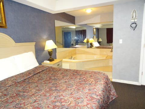 Room, 1 King Bed, Jetted Tub | Free WiFi