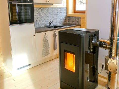 Flooring, Floor, Wood Stain, Wood-Burning Stove, Hearth, Hardwood, Design, Wood Flooring